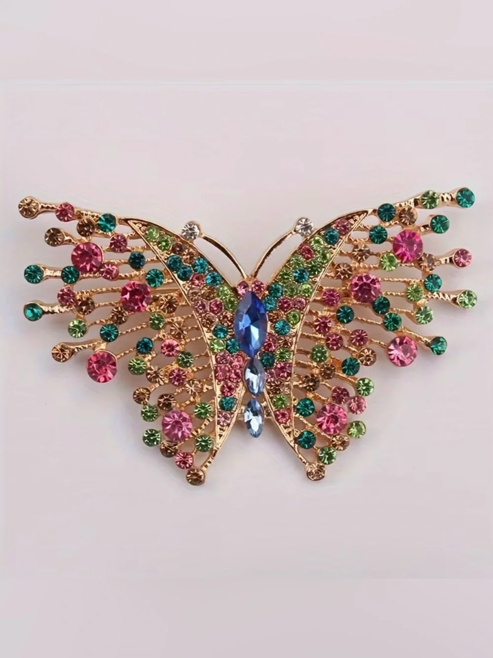 vintage gold-tone butterfly brooch adorned multicolored rhinestones & crystals